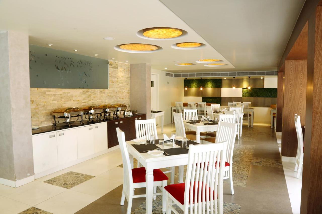 Miles Inn Hotel ハッサン エクステリア 写真