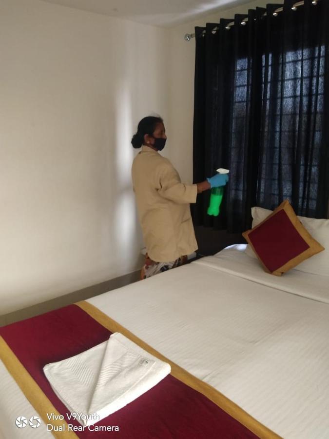 Miles Inn Hotel ハッサン エクステリア 写真